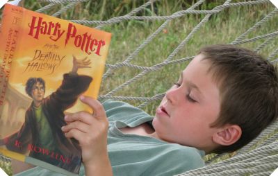 wiggly little boy reading, Harry Potter